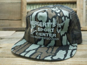Hergert’s Sport Center Oshkosh WI Camo Hat