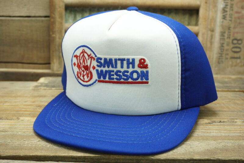 Vintage Smith & Wesson firearms, ammunition and restraints Snapback Trucker Hat Cap