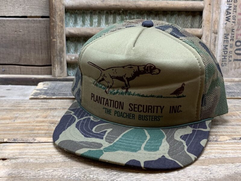 Vintage "Plantation Security Inc." "The Poacher Busters" Camo Mesh Rope Snapback Trucker Hat Cap Vernon Headliner